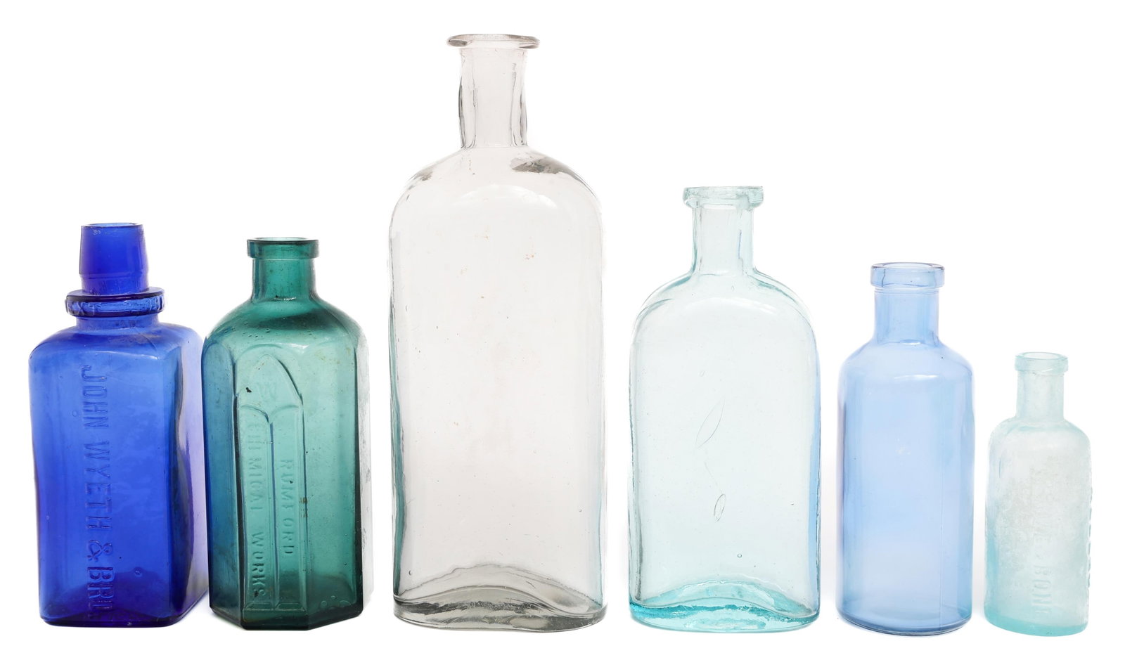 19th CENTURY GLASS MEDICINE BOTTLES: 19th CENTURY GLASS MEDICINE BOTTLES 19th Century Glass Medicine Bottles. (3) Unmarked, light blue glass bottles. (1) Glass Bottle, Dark Blue. Maker marked by John Wyeth & Bro. and Patent May 16, 1899 