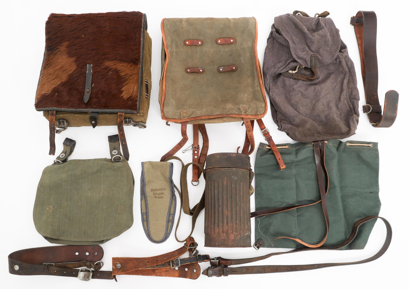 WWII GERMAN TORNISTER PACKS & FIELD GEAR: WWII GERMAN TORNISTER PACKS & FIELD GEAR WWII German Tornister Packs and Field Gear. Includes fur and canvas Tornister packs, bread bag, field pack, Draeger gas mask canister with straps, and more.