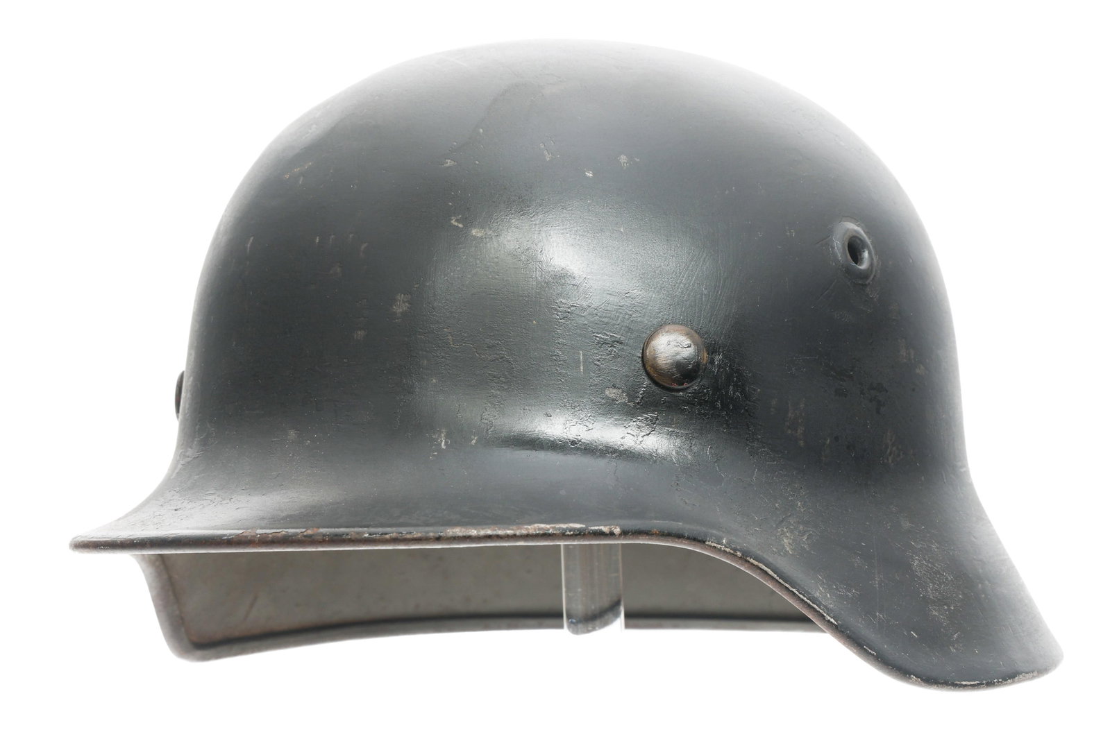 REFRUBISHED WWII GERMAN SS M40 COMBAT HELMET: REFRUBISHED WWII GERMAN SS M40 COMBAT HELMET Refurbished WWII German SS M40 Combat Helmet. Repainted, black outer shell. Maker marked by EF62. Serial number 725 stamped on the brim. Ink stamped on
