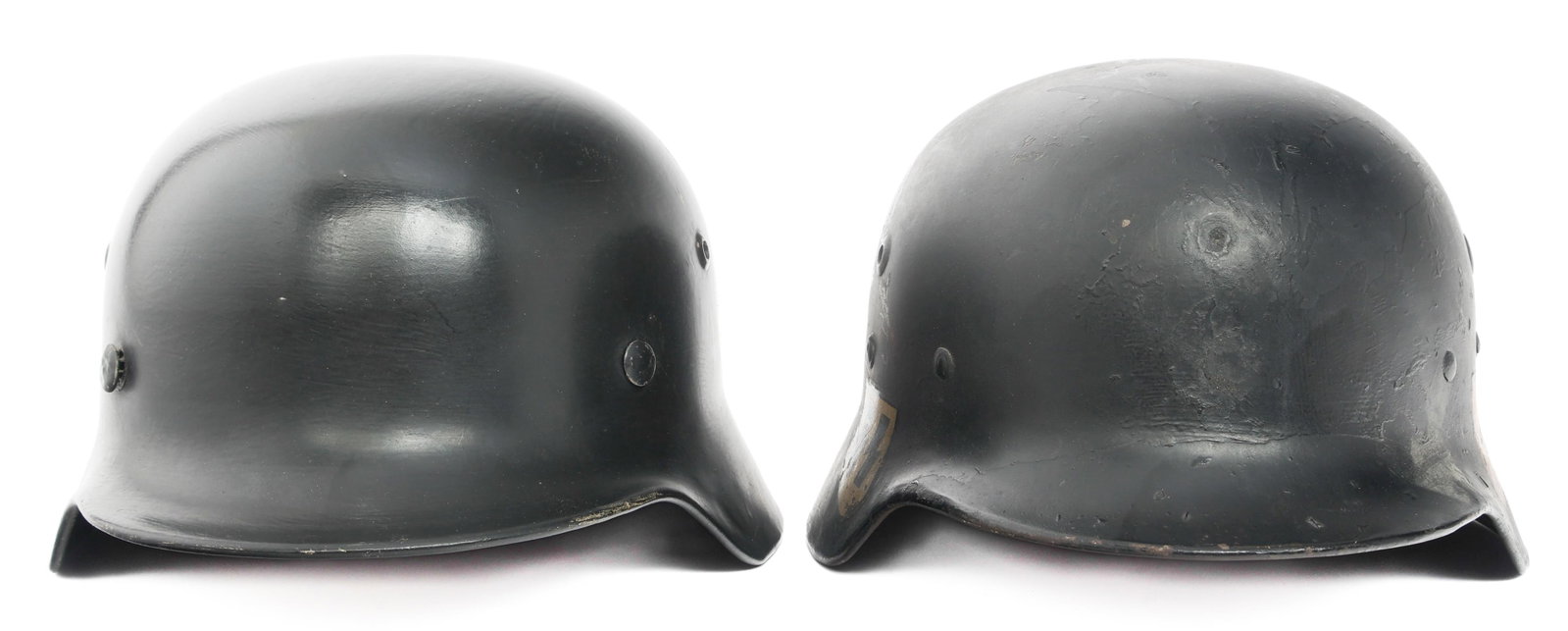 REFURB WWII GERMAN HEER & SS DD M35 COMBAT HELMETS: REFURB WWII GERMAN HEER & SS DD M35 COMBAT HELMETS Refurbished WWII German Heer and SS Double Decal Combat Helmets. Repainted shells with Heer, SS and National Tri color decals. One with maker mark