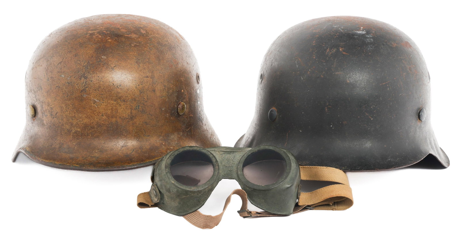 REFURBISHED WWII GERMAN ARMY M40 & M42 HELMETS: REFURBISHED WWII GERMAN ARMY M40 & M42 HELMETS Refurbished WWII German Army M40 and M42 Combat Helmets. (1) Khaki painted M40 Helmet and Goggles. Complete leather suspension and leather chinstrap. No
