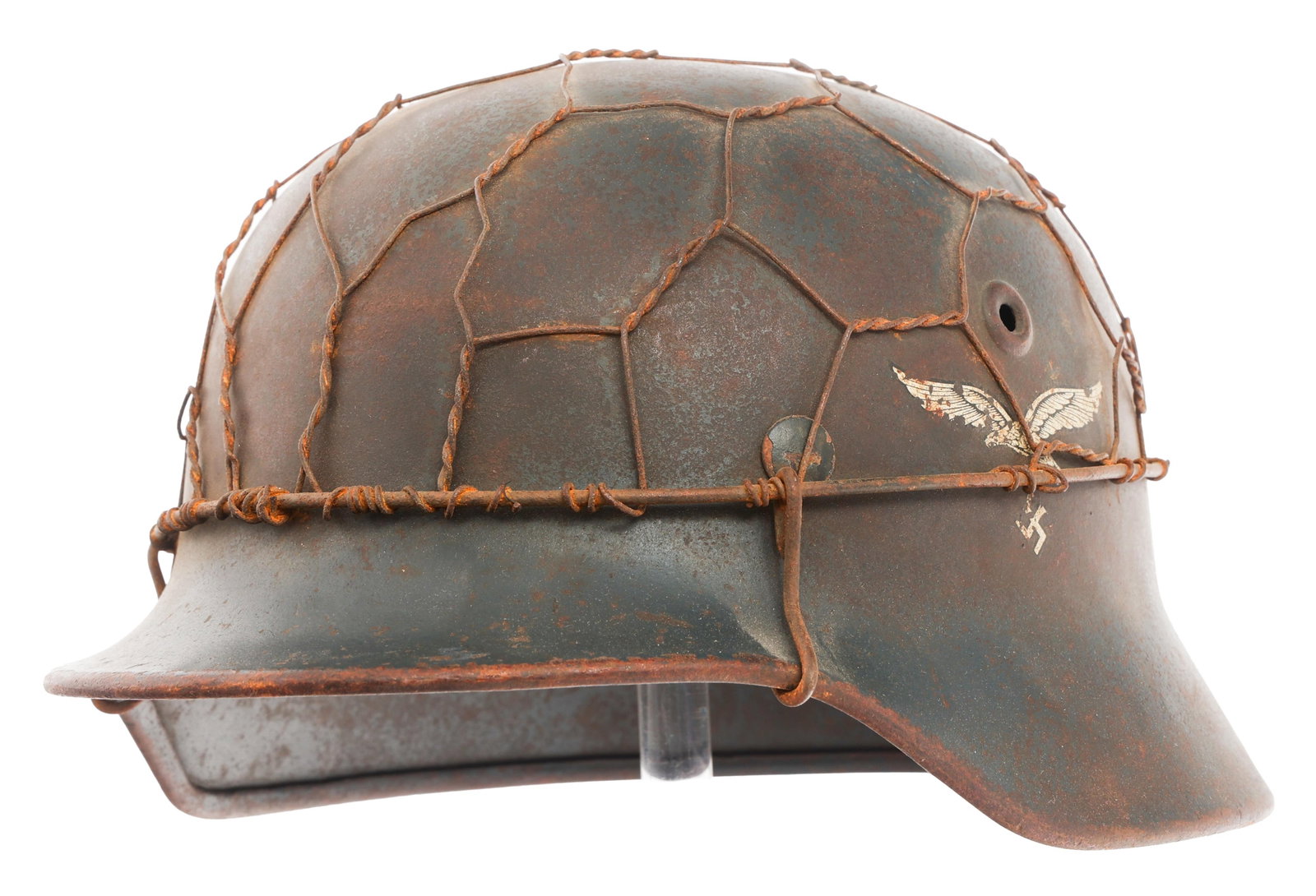 REFURBISHED WWII GERMAN LUFTWAFFE SD M40 HELMET: REFURBISHED WWII GERMAN LUFTWAFFE SD M40 HELMET Refurbished WWII German Luftwaffe SD M40 Combat Helmet. Luftwaffe Eagle decal on the left side. Twisted wire cover. Faded maker mark. No visible serial