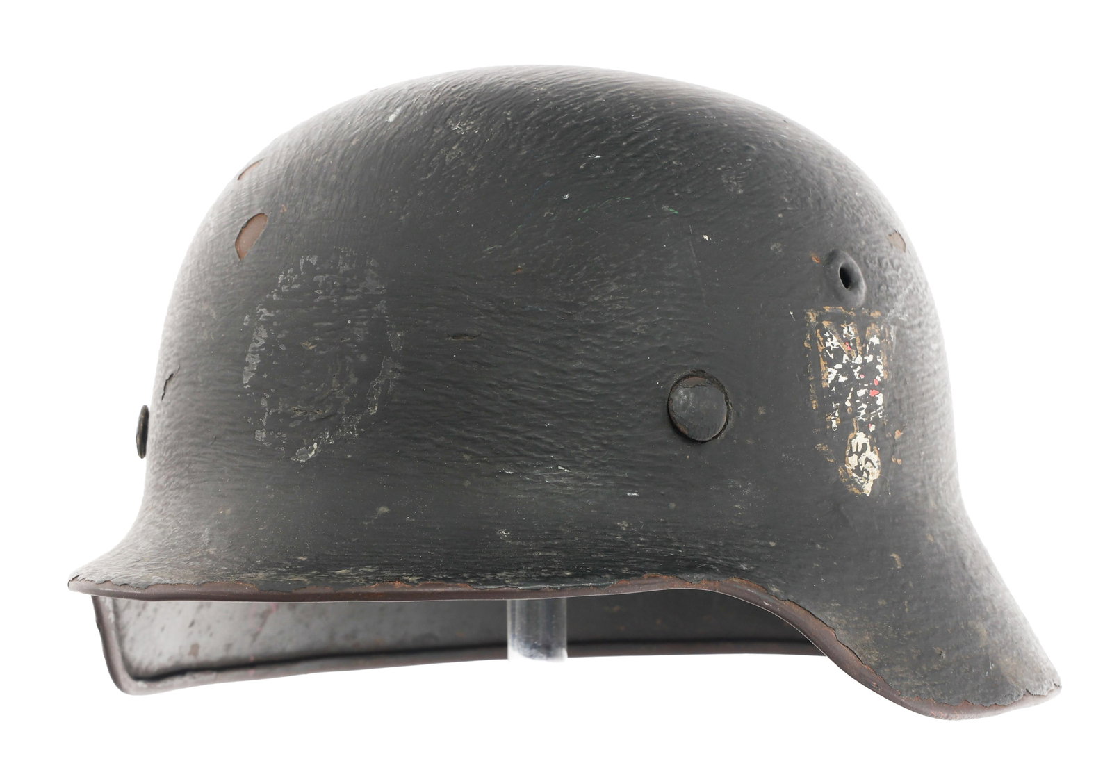 REFURBISHED WWII GERMAN M35 COMBAT HELMET: REFURBISHED WWII GERMAN M35 COMBAT HELMET Refurbished WWII German M35 Combat Helmet. Named to Nordheim. Repainted shell with faded decals, steel band, eight tongue replacement leather liner and