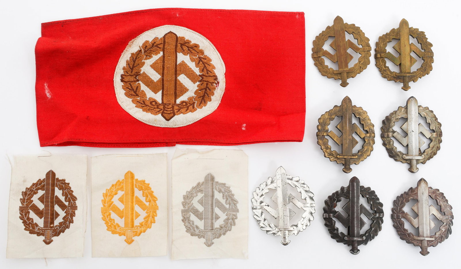 WWII GERMAN SA ARMBAND, PATCHES & SPORT BADGES: WWII GERMAN SA ARMBAND, PATCHES & SPORT BADGES WWII German SA Armband, Patches and Sport Badges. (1) Armband. (3) Patches. Bronze, silver, and gold grades. (7) Sports Badges. Bronze, silver, and gold 