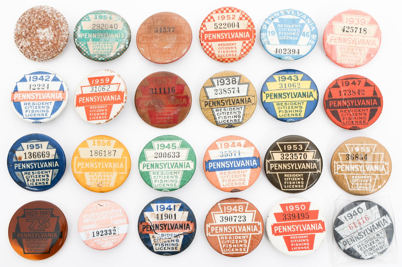 1939-1997 PENNSYLVANIA FISHING LICENSE BUTTONS (1 of 12)