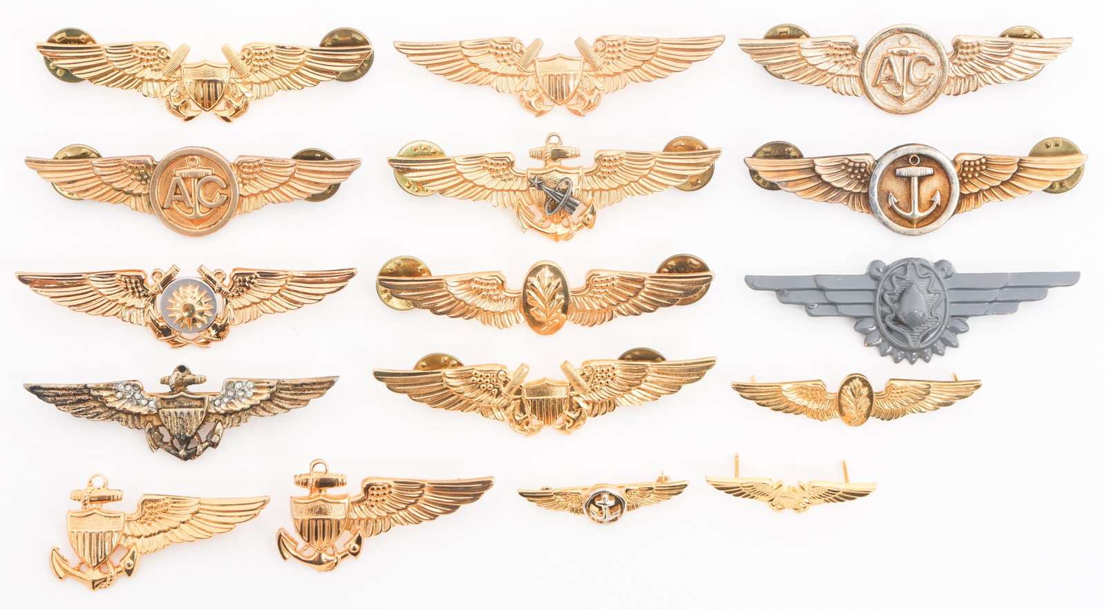 WWII - COLD WAR USN AVIATOR QUALIFICATION WINGS: WWII - COLD WAR USN AVIATOR QUALIFICATION WINGS WWII - Cold War USN Aviator Qualification Wings. Various makers. Includes Aviator, Flight Surgeon, Navigator, Air Crew, Astronaut, Navigator and more. S