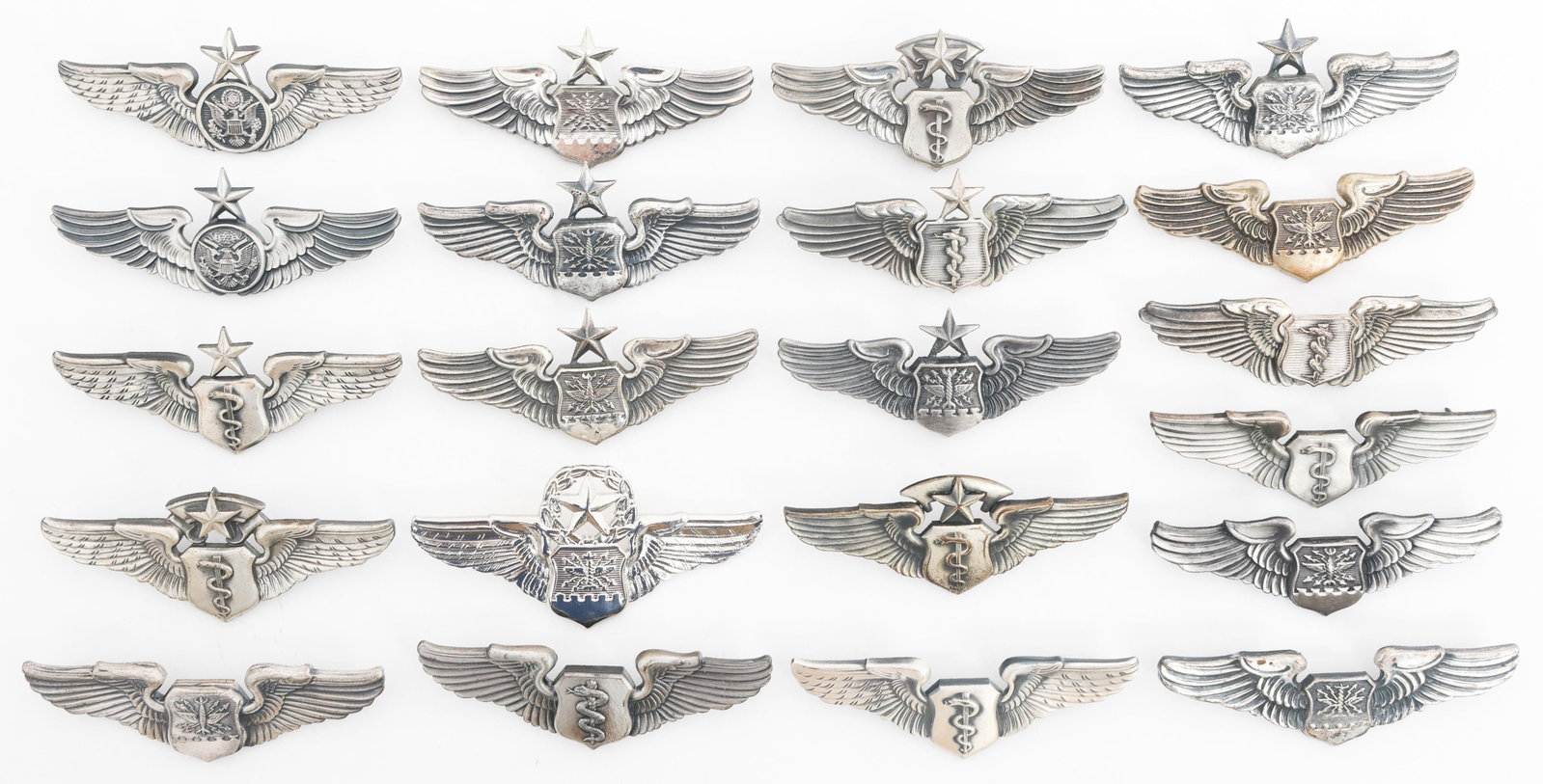 COLD WAR - CURRENT USAF NAVIGATOR & AIR CREW WINGS: COLD WAR - CURRENT USAF NAVIGATOR & AIR CREW WINGS Cold War to Current US Air Force Navigator, Air Crew, and Flight Surgeon Wings. All but one are Clutchbacks. Maker marks include N.S. Meyer,