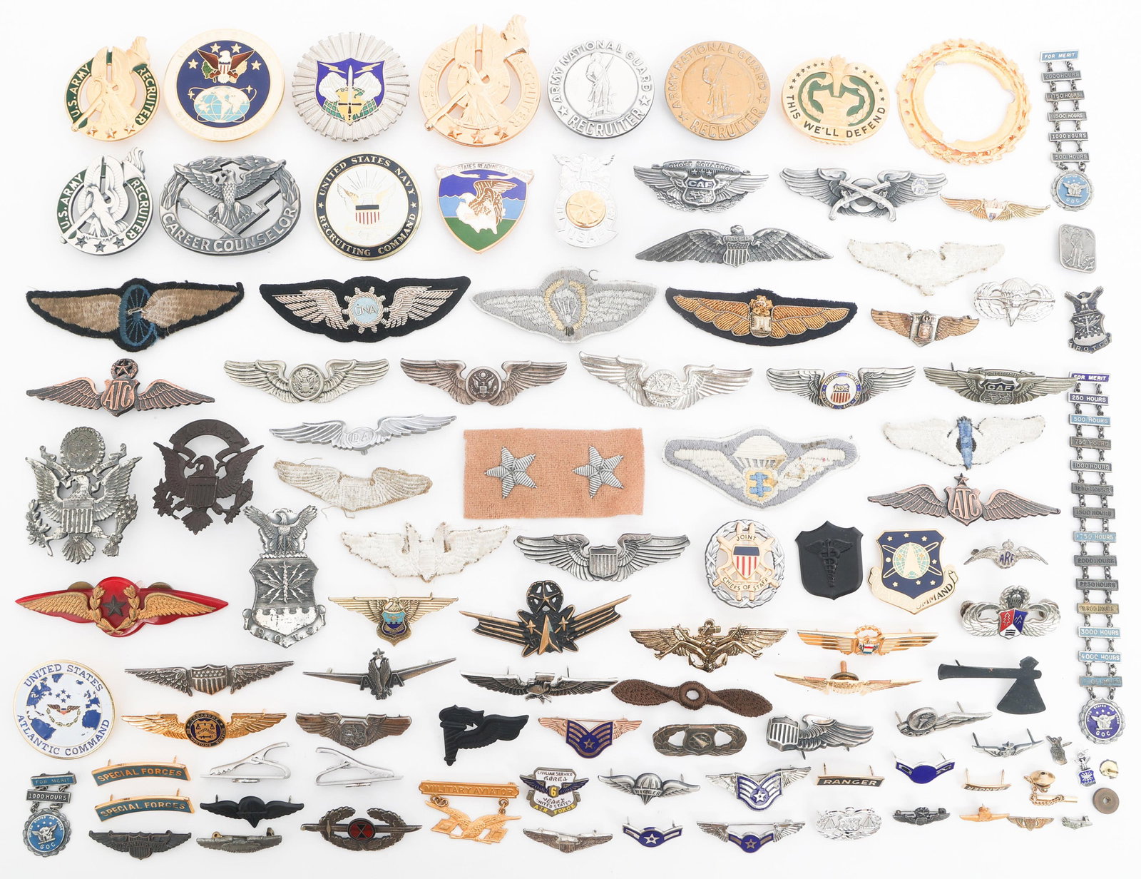 WWII - COLD WAR US & WORLD WINGS & INSIGNIA: WWII - COLD WAR US & WORLD WINGS & INSIGNIA WWII - Cold War US and World Wings, Service Badges, and Pins. Almost all are pinback. Includes embroidered and badge wings. Some WWII wings are restrikes. S