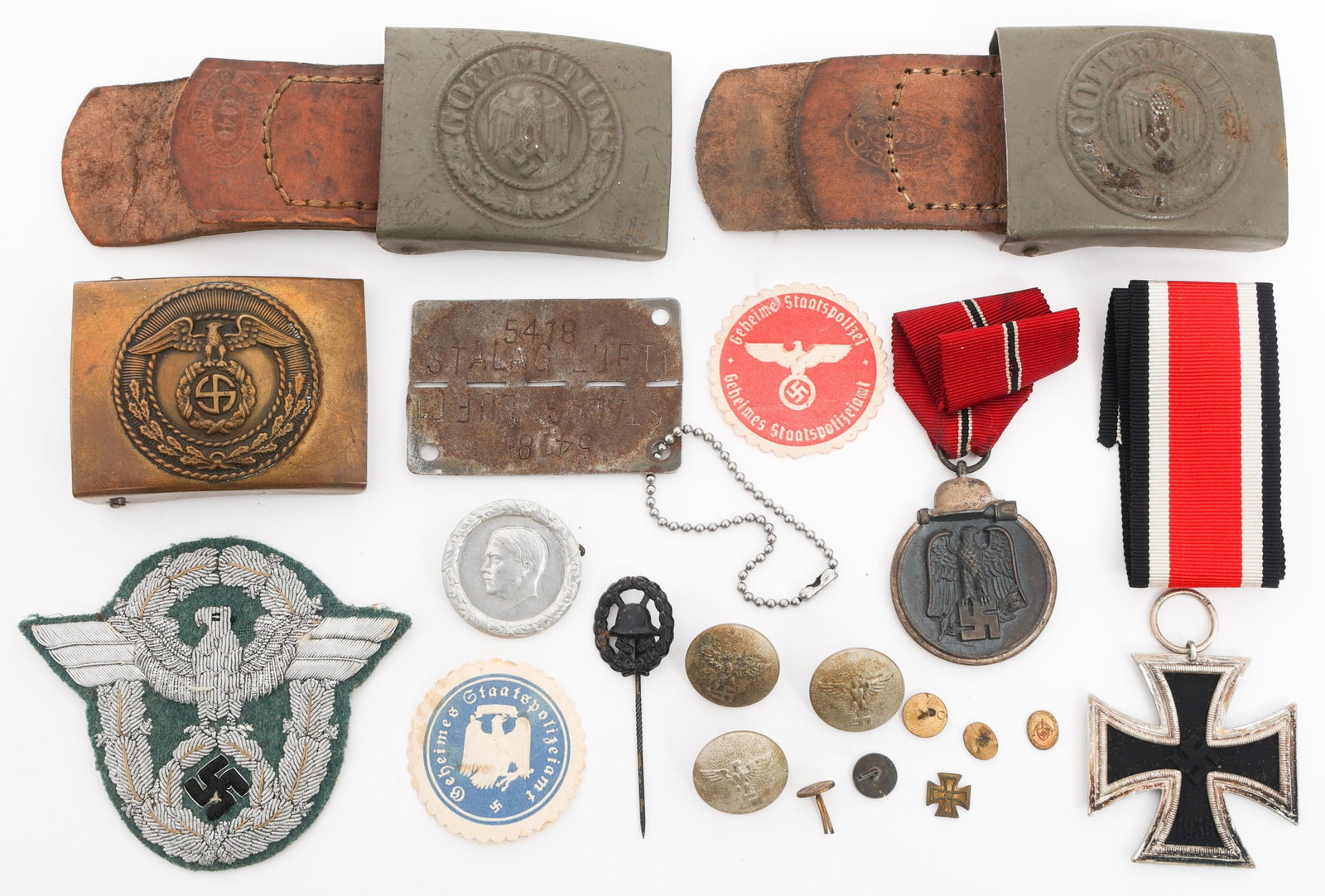 WWII GERMAN HEER MEDALS, BUCKLES & PERSONAL GEAR: WWII GERMAN HEER MEDALS, BUCKLES & PERSONAL GEAR WWII German Heer Medals and Personal Gear. (1) Eastern Front Medal dated 1942. (1) Iron Cross 2nd Class. Stamped "27" on ring for Anton Schenkls Nachfo