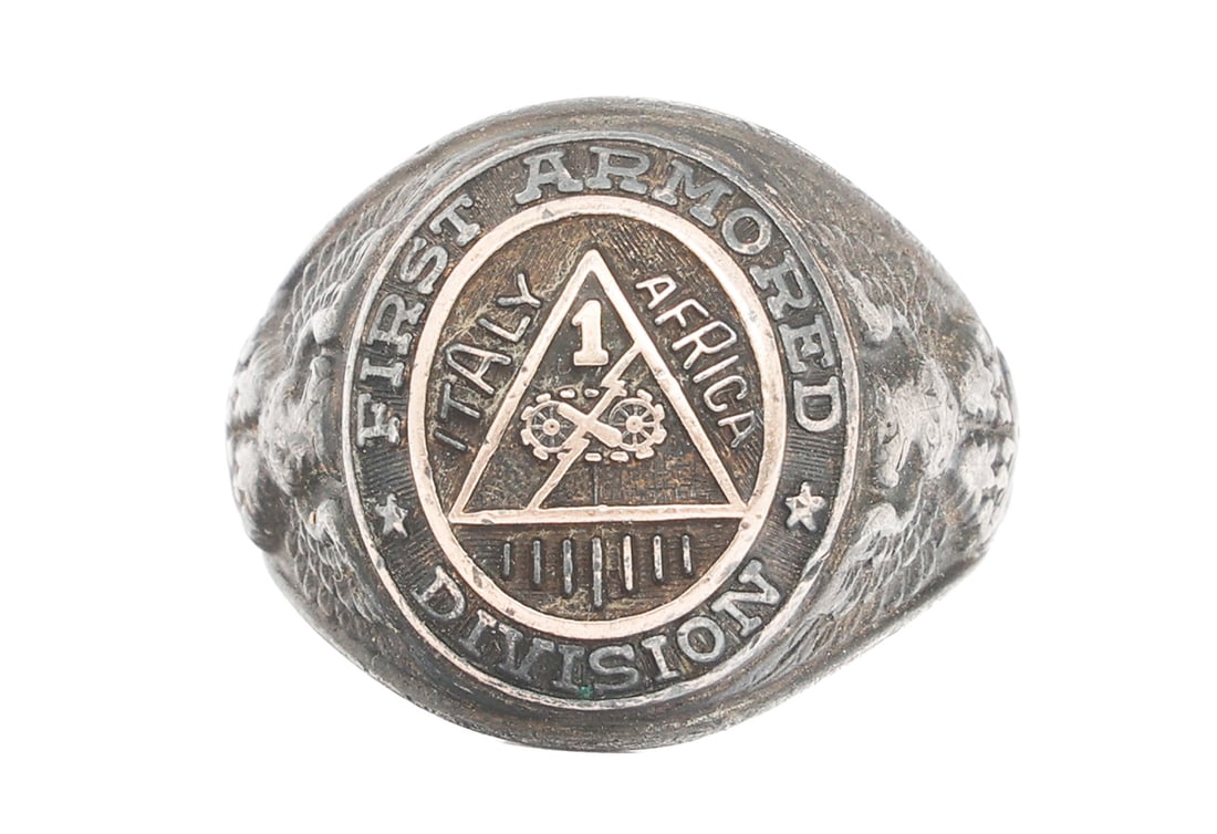 WWII US 1st ARMORED DIVISION STERLING SILVER RING: WWII US 1st ARMORED DIVISION STERLING SILVER RING WWII US 1st Armored Division commemorative sterling silver ring. Maker marked by HJ Co inside the ring. Size: 9.5 Weight: 12 g