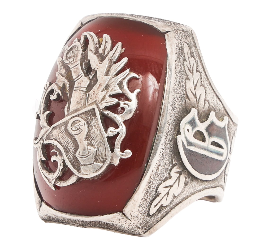 1930s GERMAN HERMANN GOERING ATTRIBUTED RING: 1930s GERMAN HERMANN GOERING ATTRIBUTED RING 1930s German Hermann Goering Attributed Ring. Silver with carnelian stone, Goering family crest and initials on both sides. No visible maker marks. Size: