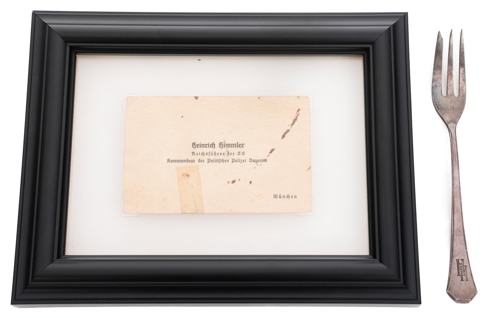 WWII GERMAN SS HEINRICH HIMMLER FORK & CARD: WWII GERMAN SS HEINRICH HIMMLER FORK & CARD WWII German SS Heinrich Himmler Silver Plated Fork & Card. Fork monogrammed HH. Maker marked by WMF Co. Also includes framed Himmler name card.