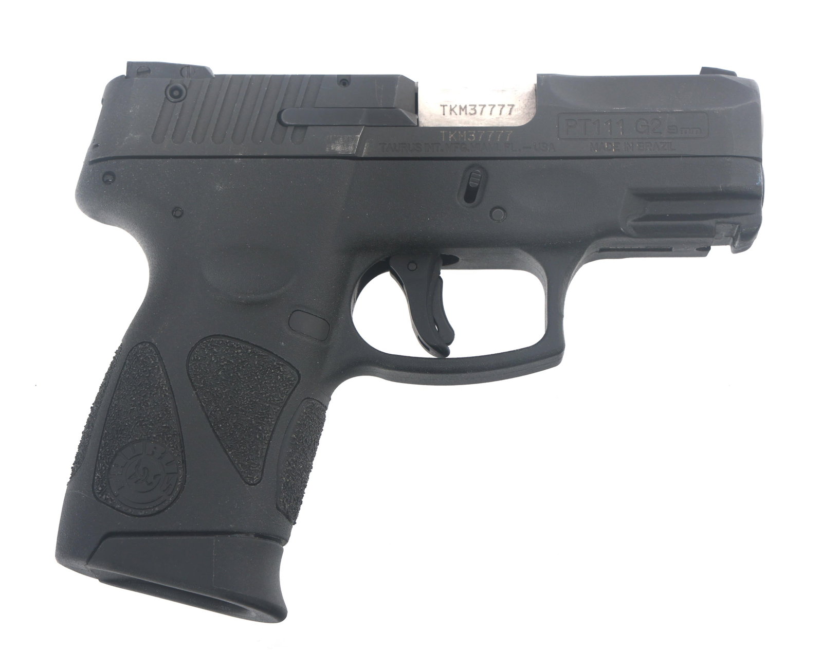 TAURUS MODEL MILLENNIUM G2 9x19mm CALIBER PISTOL: TAURUS MODEL MILLENNIUM G2 9x19mm CALIBER PISTOL Taurus Model Millennium G2 9x19mm caliber semi-automatic pistol. Import stamped Taurus. Polymer frame with textured grips. Fixed sights. One magazine. 