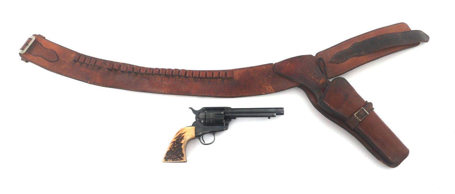 1900 COLT SAA .38 REVOLVER & ANDY ANDERSON HOLSTER: 1900 COLT SAA .38 REVOLVER & ANDY ANDERSON HOLSTER 1900 Colt Single Action Army .38-40 caliber revolver with Andy Anderson holster and belt. Serial number matches on frame, trigger guard, and butt. Re