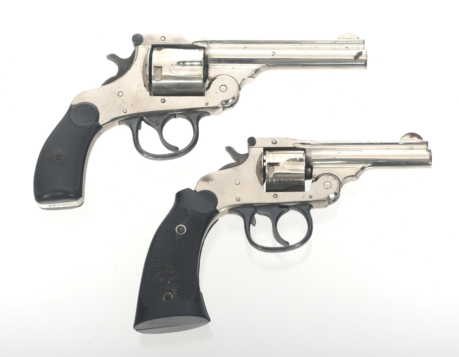 H&R .38 AND .32 CALIBER TOP BREAK DA REVOLVERS: H&R .38 AND .32 CALIBER TOP BREAK DA REVOLVERS Two Harrington & Richardson double action revolvers. A) H&R .38 S&W top break DA revolver. Nickel finish. Five shot fluted cylinder. Hard rubber grips. B