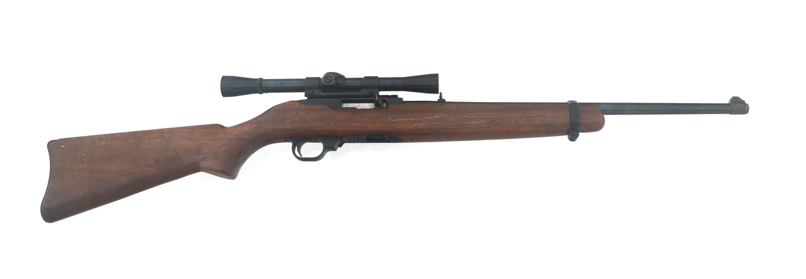 RUGER MODEL 10/22 .22 LR CALIBER CARBINE: RUGER MODEL 10/22 .22 LR CALIBER CARBINE 1966 Ruger Model 10/22 .22 LR caliber semi automatic carbine. Blued finish. Adjustable rear sight. Wood stock with metal butt plate. One magazine. Weaver C4 sc