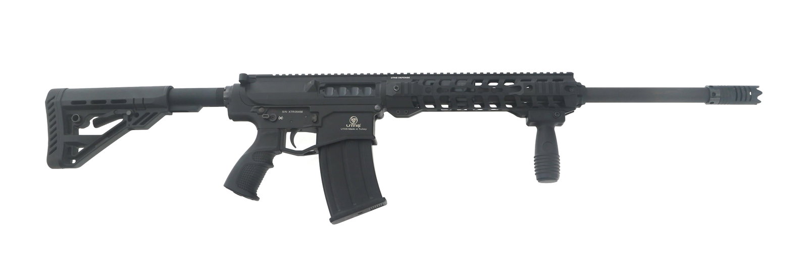 UTAS MODEL XTR-12 12 GA SEMI AUTOMATIC SHOTGUN: UTAS MODEL XTR-12 12 GA SEMI AUTOMATIC SHOTGUN UTAS Model XTR-12 12 Gauge semi automatic shotgun. 3" shells. Matte black finish. Full flat top. Muzzle break. Vertical grip. Adjustable stock. One magaz