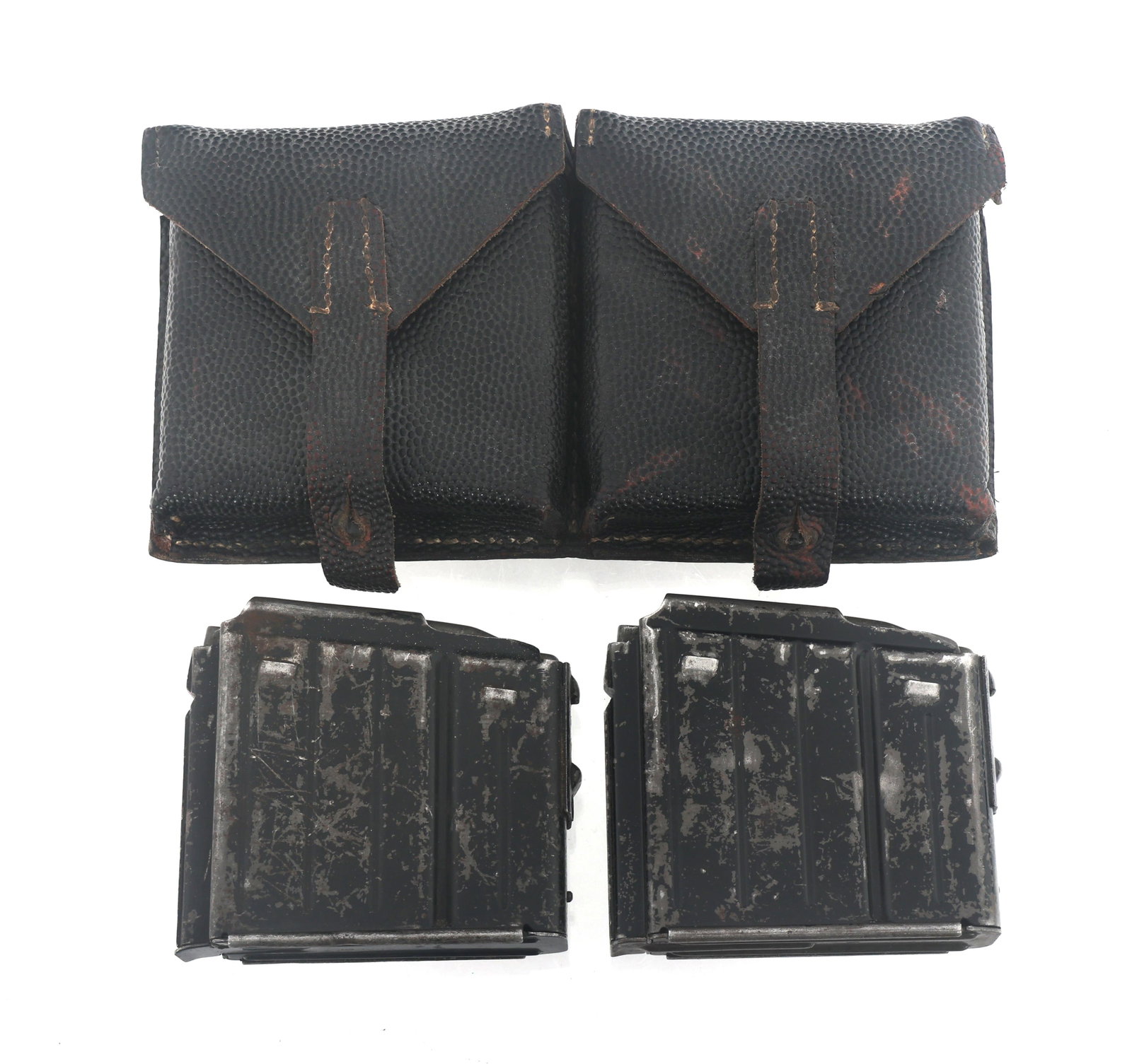 WWII GERMAN K43 MAGAZINES AND POUCH: WWII GERMAN K43 MAGAZINES AND POUCH WWII German K43 magazines and pouch. Magazines stamped gcb, Waffenamt b92, and K43. Leather pouch stamped svw - 44 inside flap.