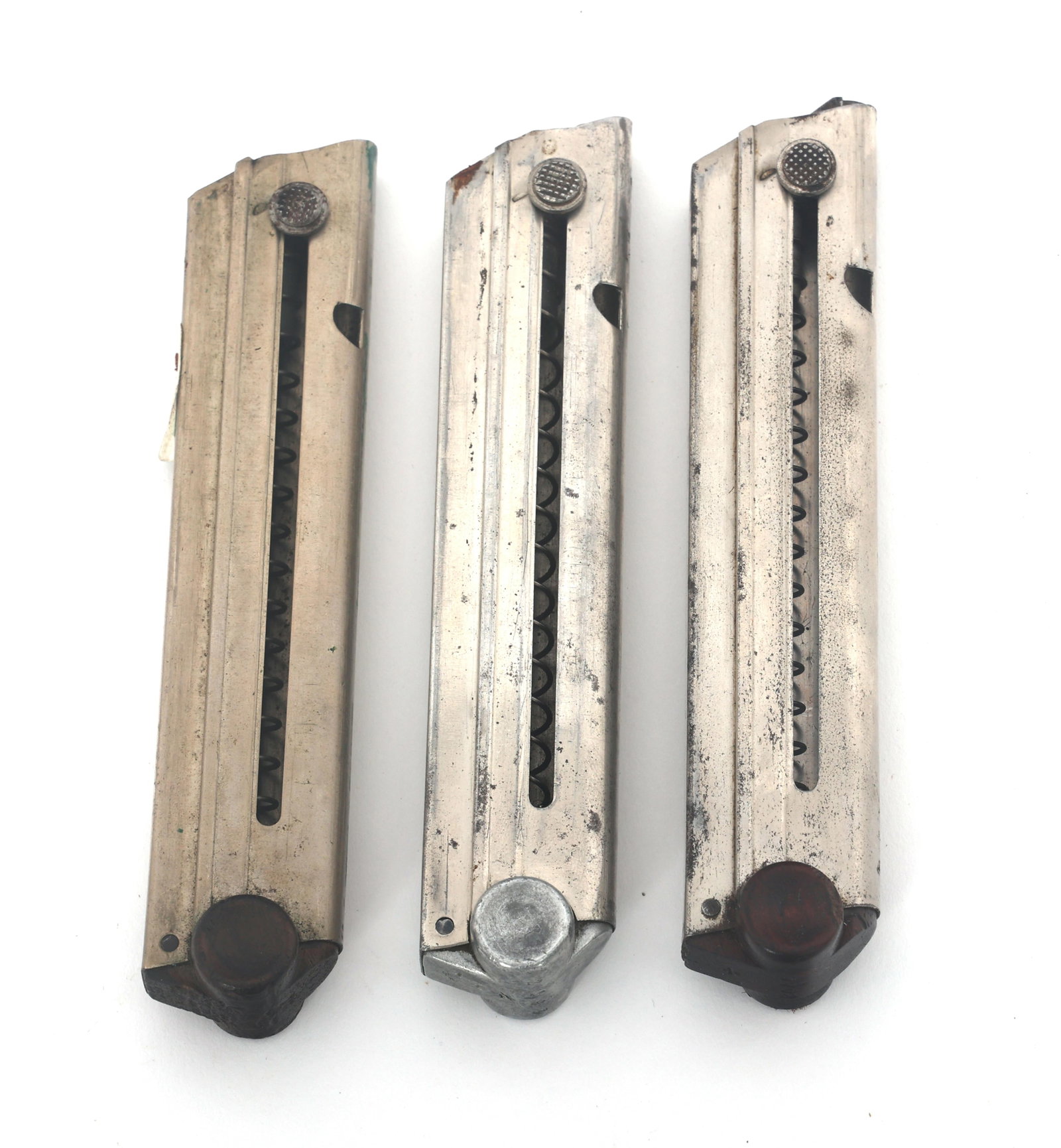 GERMAN MODEL P08 LUGER MAGAZINES: GERMAN MODEL P08 LUGER MAGAZINES Three German P08 Luger magazines. One aluminum base numbered 2163b. One wood based numbered 5702. One wood based numbered 541.