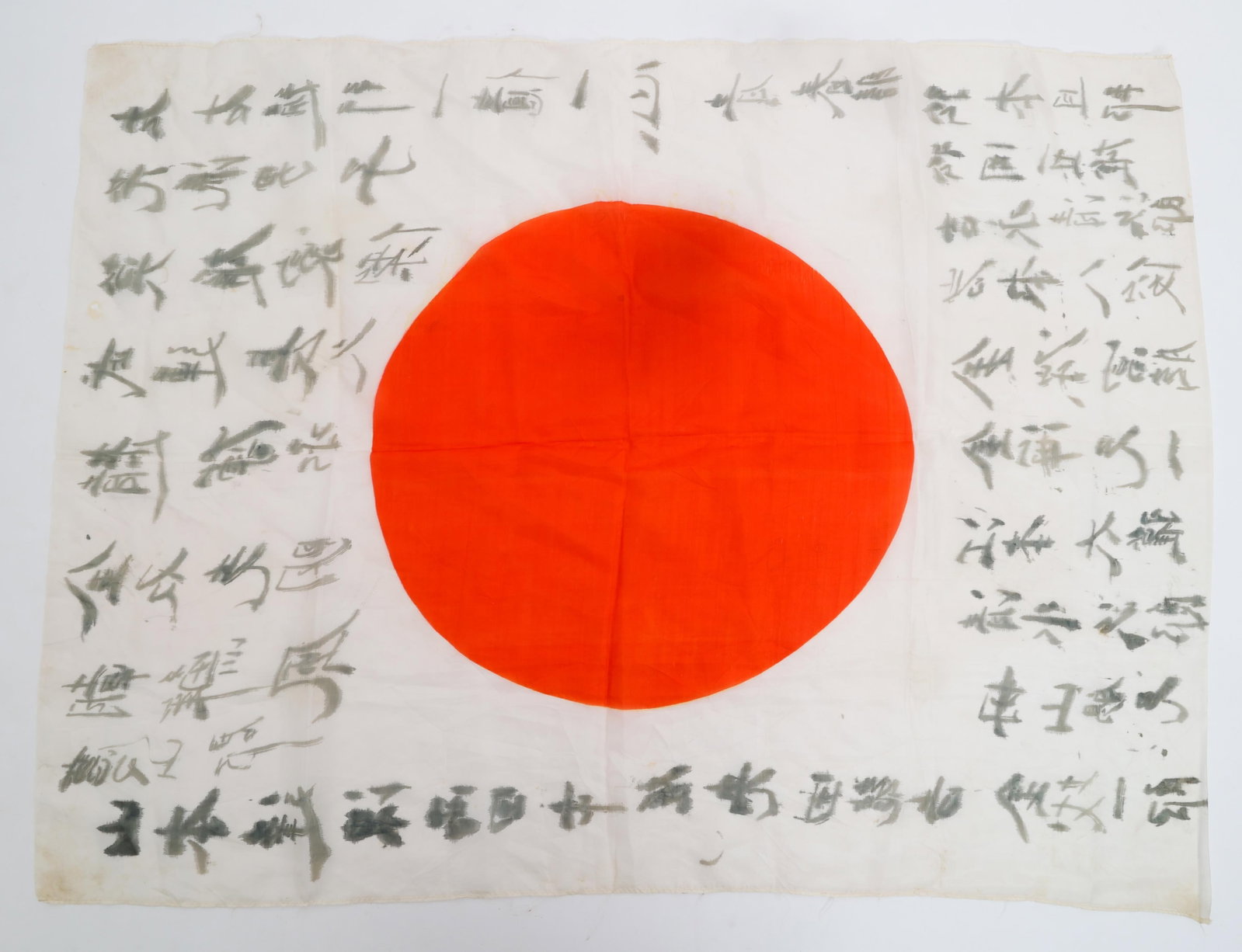 WWII IMPERIAL JAPANESE YOSEGAKI HINOMARU FLAG: WWII IMPERIAL JAPANESE YOSEGAKI HINOMARU FLAG WWII Imperial Japanese Yosegaki Hinomaru Flag. Double sided, single piece silk with printed emblem and handwritten kanji. Size: 27" x 36"