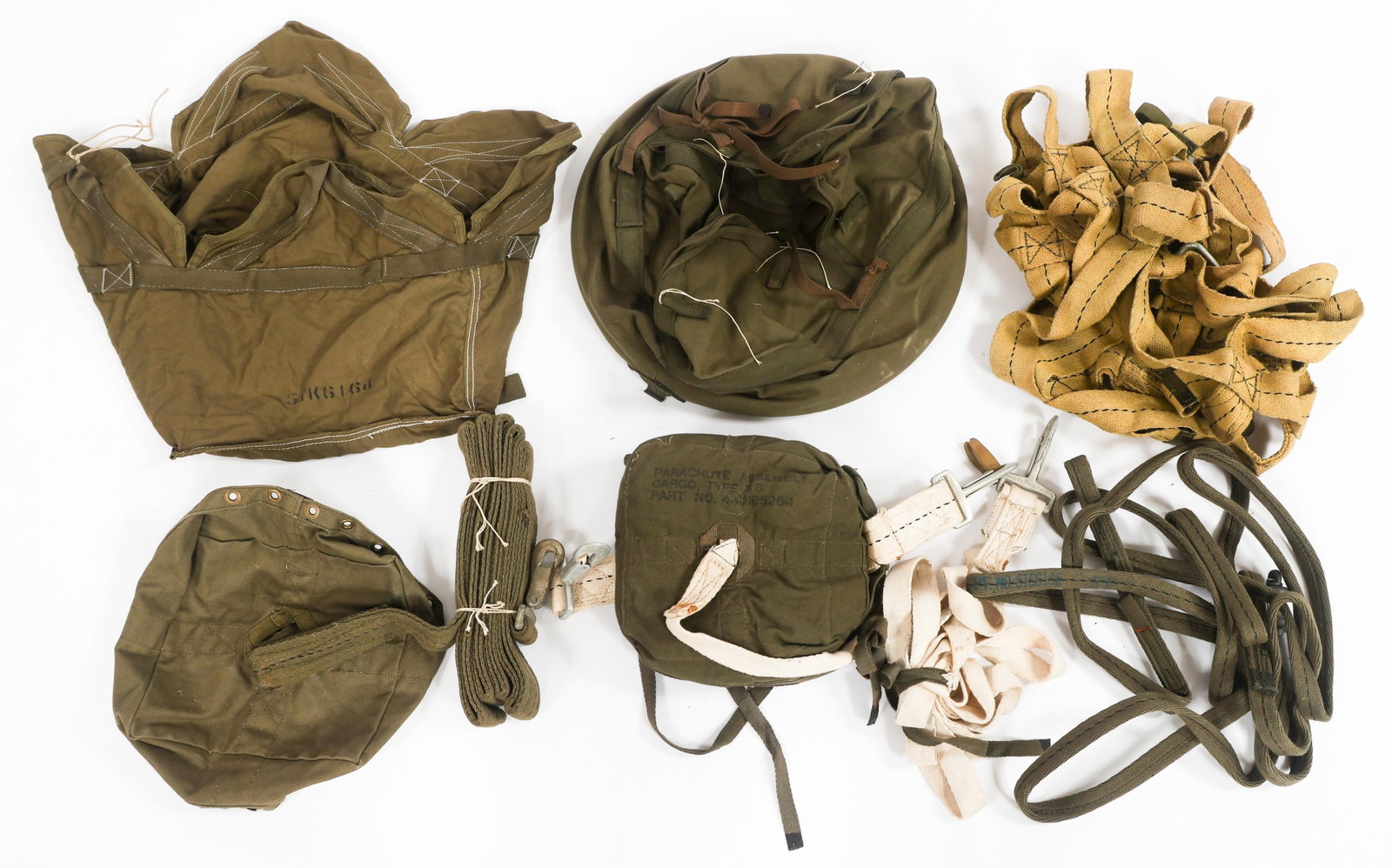 1950s US ARMY AIRBORNE PARACHUTE HARNESS & GEAR: 1950s US ARMY AIRBORNE PARACHUTE HARNESS & GEAR 1950s US Army Airborne Parachute Harness and Gear. Includes parachute assembly cargo type 58, harness straps, reserve chute bag, and more.