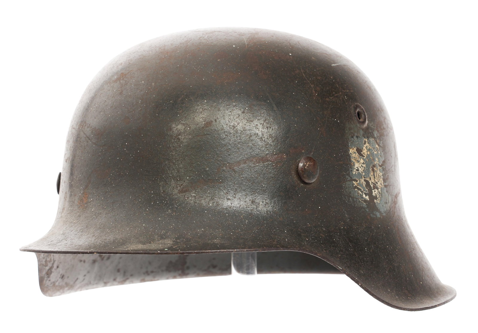 WWII GERMAN HEER M42 COMBAT HELMET: WWII GERMAN HEER M42 COMBAT HELMET WWII German Heer M42 Combat Helmet. Heer and post-war painted swastika decals. Leather 8 tongue liner with string. Serial number 8838. Heat stamped CKI64. Size: 64