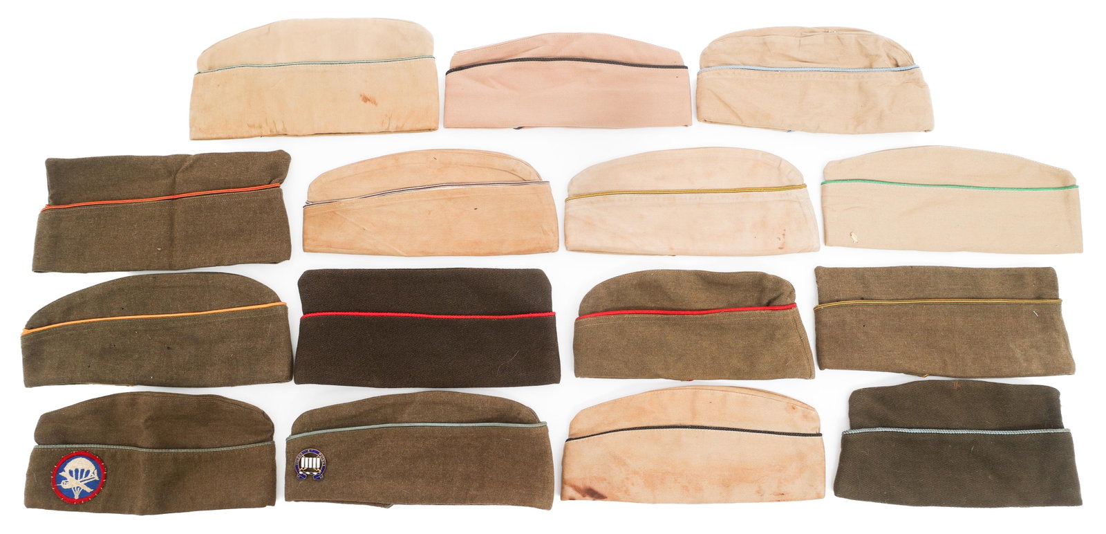 WWII US ARMY KHAKI COTTON & WOOL GARRISON CAPS: WWII US ARMY KHAKI COTTON & WOOL GARRISON CAPS WWII US Army Garrison caps. Khaki cotton and wool. Insignia includes Airborne and 7th infantry division. Various sizes, piping colors and maker marks.