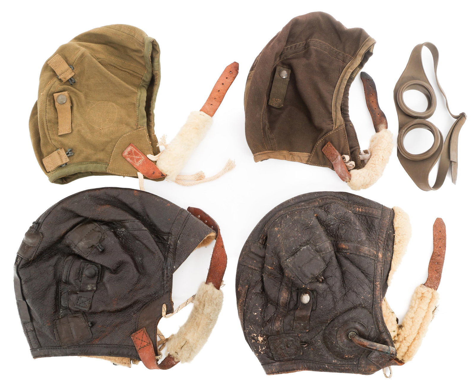 WWII US AAF TYPE A-9, B-5, & B-6 FLYING HELMETS: WWII US AAF TYPE A-9, B-5, & B-6 FLYING HELMETS WWII US Army Air Forces Leather and Canvas Flight Helmets. (1) Type B-6 Winter Flying Helmet. Leather and sheepskin lining with chinstrap pad. Size: Sma