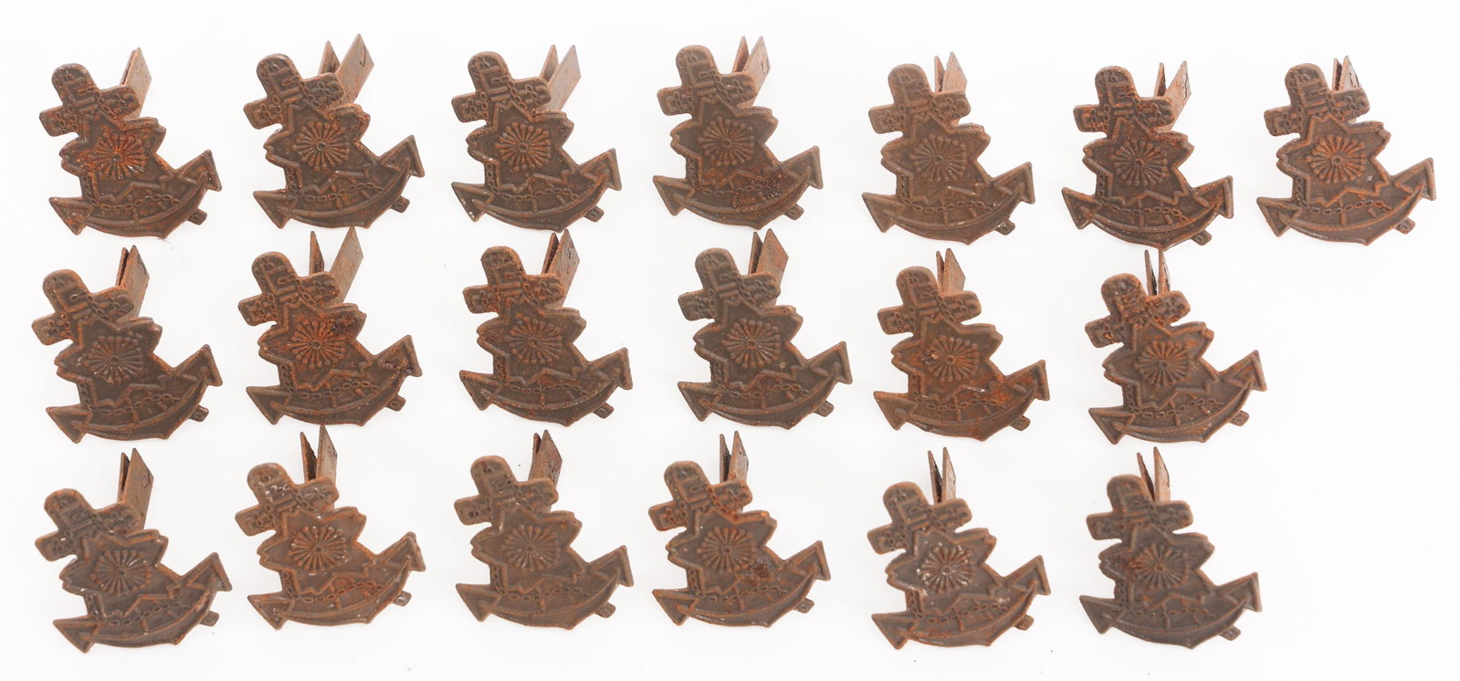 WWII JAPANESE NAVAL LANDING FORCE HELMET BADGES: WWII JAPANESE NAVAL LANDING FORCE HELMET BADGES WWII Imperial Japanese Naval Landing Force Helmet Badges. Steel with double prongs. No visible maker marks. Size: 1 1/8" x 3/4"