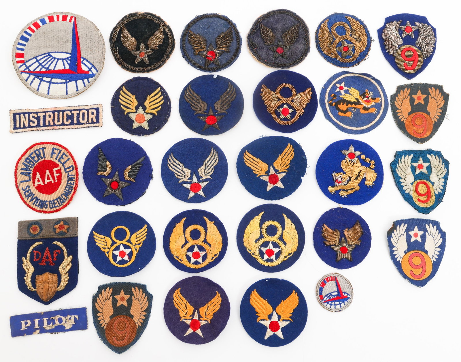WWII FLYING TIGERS 8th & 9th AAF BULLION PATCHES: WWII FLYING TIGERS 8th & 9th AAF BULLION PATCHES WWII US Flying Tigers, 8th, and 9th Army Air Force Bullion Patches. Nine have bullion thread. Half are machine embroidered, the other half are hand sti