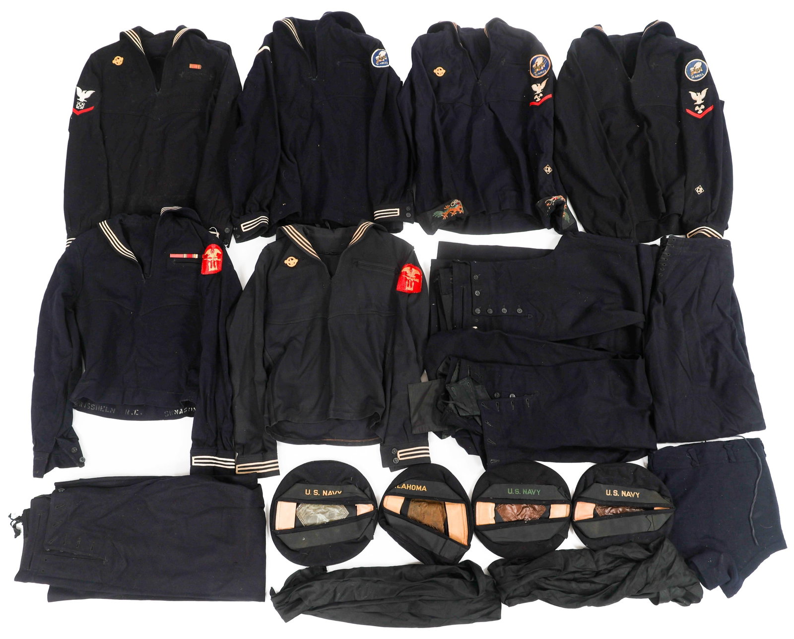 WWII USN JUMPER UNIFORMS & DONALD DUCK CAPS: WWII USN JUMPER UNIFORMS & DONALD DUCK CAPS WWII USN Jumper Uniforms and Donald Duck Caps. (6) Jumpers. Seabees and Engineer Special Brigade shoulder patches. Petty officer third class ranks with vari