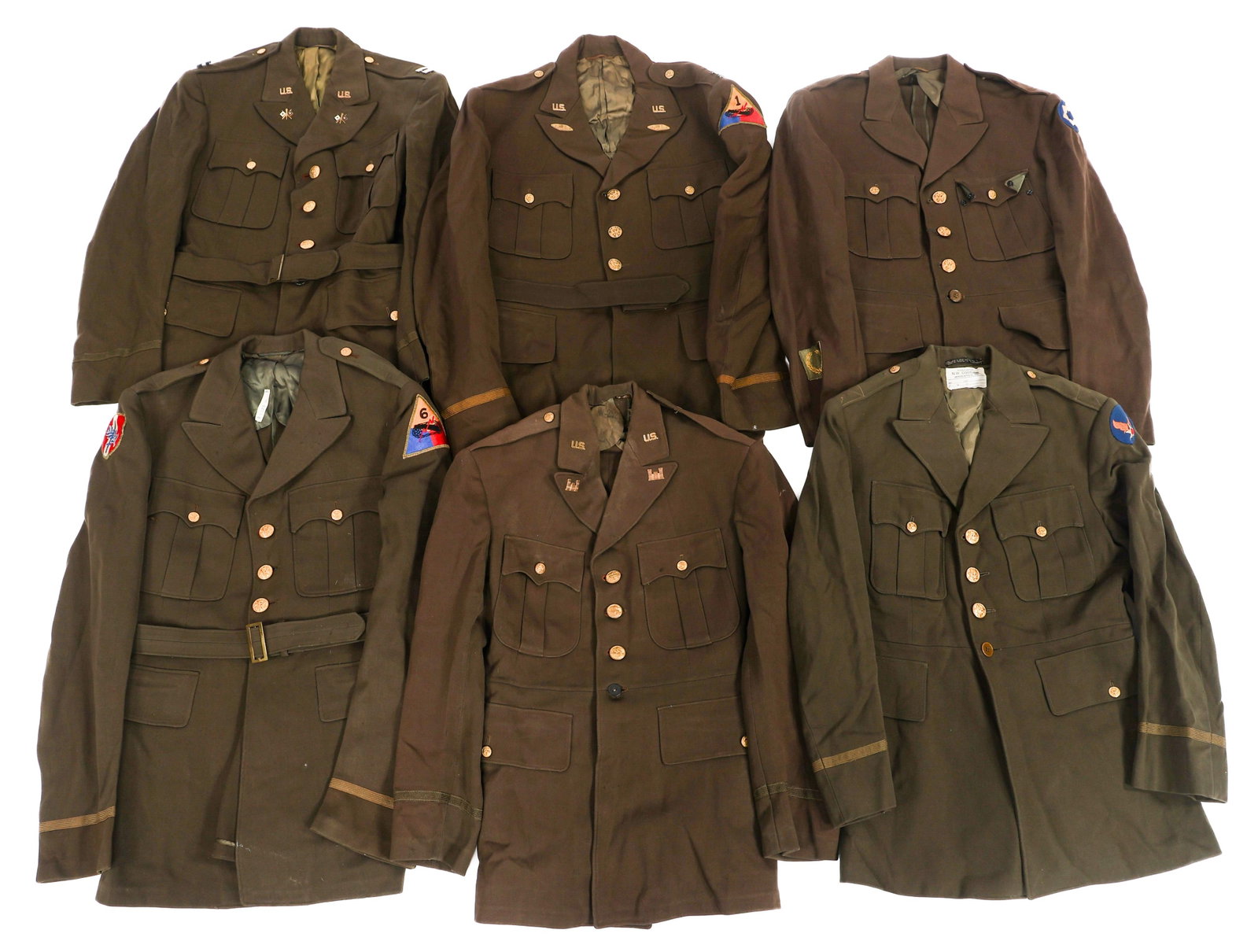 WWII US ARMY OFFICER OD ELASTIQUE SERVICE TUNICS: WWII US ARMY OFFICER OD ELASTIQUE SERVICE TUNICS WWII US Army Chocolate Elastique Officer Service Tunics. (6) Officer tunics. Chocolate Elastique. Insignia include Service Sleeve Bars, Meritorious Uni