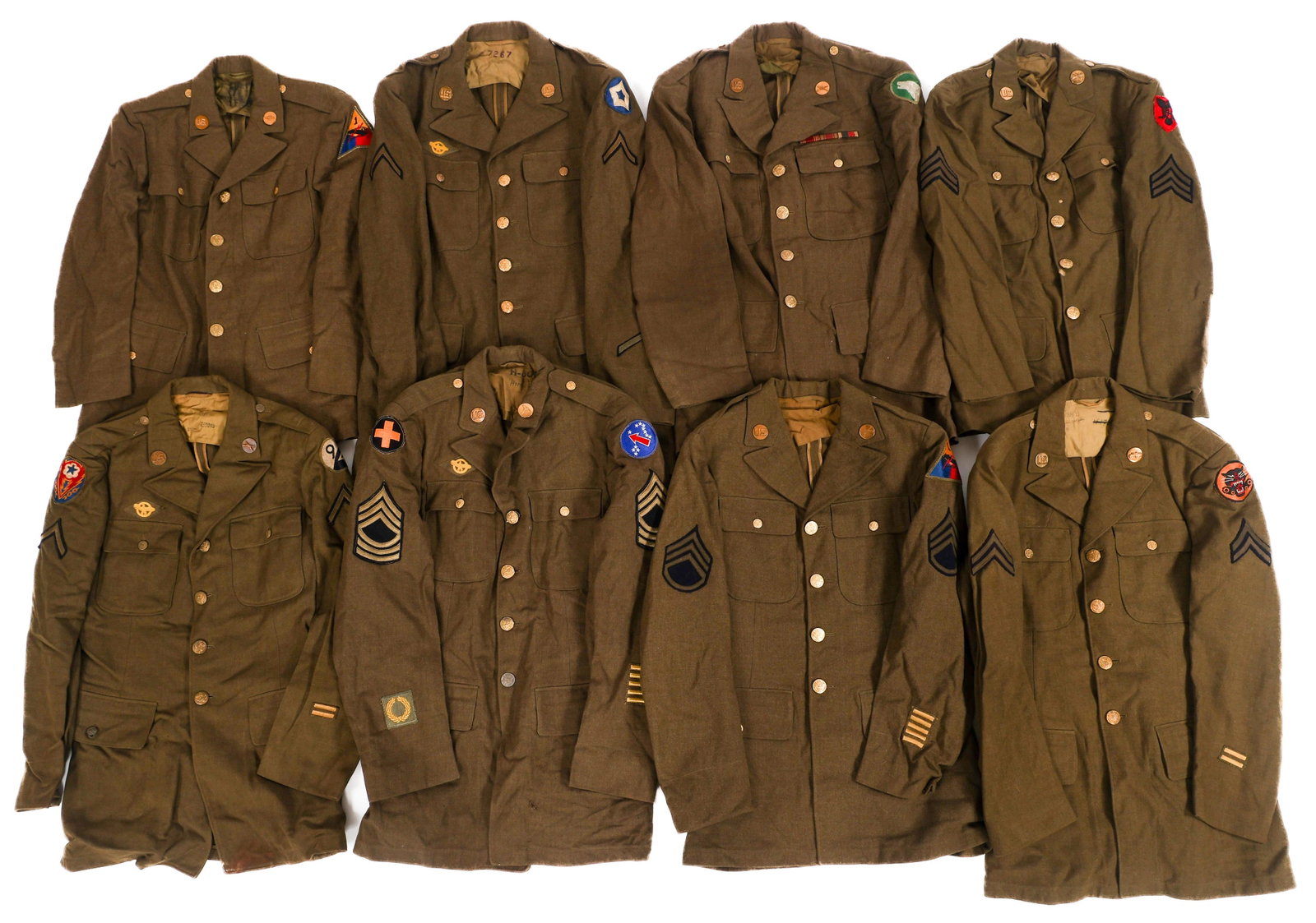 WWII US ARMY TANKER & INFANTRY SERVICE TUNICS: WWII US ARMY TANKER & INFANTRY SERVICE TUNICS (8) WWII US Army Tanker and Infantry OD Wool Service Tunics. Patches include 1st Armored Division, 104th Infantry, 86th Infantry, Tank Destroyer and more.
