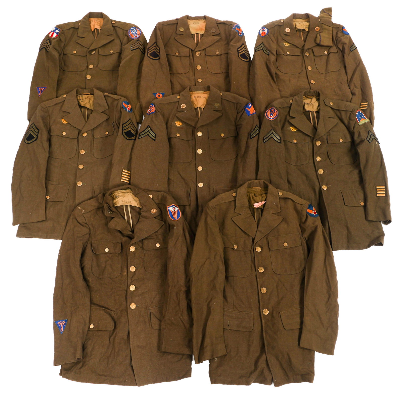 WWII USAAF EM CIB & 20th AF SERVICE TUNICS: WWII USAAF EM CIB & 20th AF SERVICE TUNICS WWII US Army Air Force Enlisted Man OD Serge Wool Service Tunics. Patches include CIB, 20th Air Force, 9th Air Force, 8th Air Force, 5th Air Force, South Atl