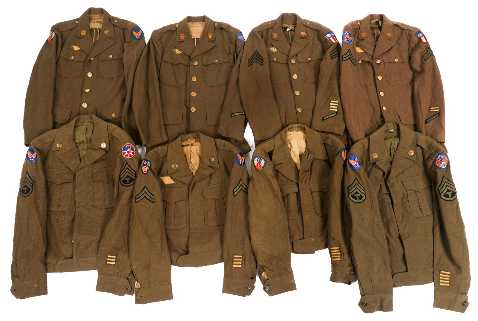 WWII USAAF IKE JACKETS & SERVICE DRESS TUNICS: WWII USAAF IKE JACKETS & SERVICE DRESS TUNICS WWII US Army Air Force Ike Jackets and Service Dress Tunics. (4) OD wool Ike jackets. Patches include 9th Air Force, 7th Air Force, 10th Air Force, and mo