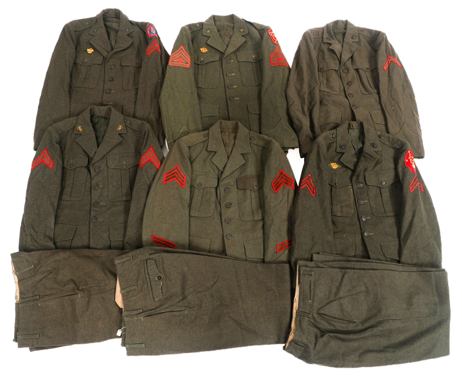 WWII USMC SERVICE ALPHA DRESS UNIFORMS: WWII USMC SERVICE ALPHA DRESS UNIFORMS WWII USMC Service Alpha Dress Uniforms. Forest green wool dress tunics and trousers. Various shoulder unit patches and rank insignia. Size: Medium