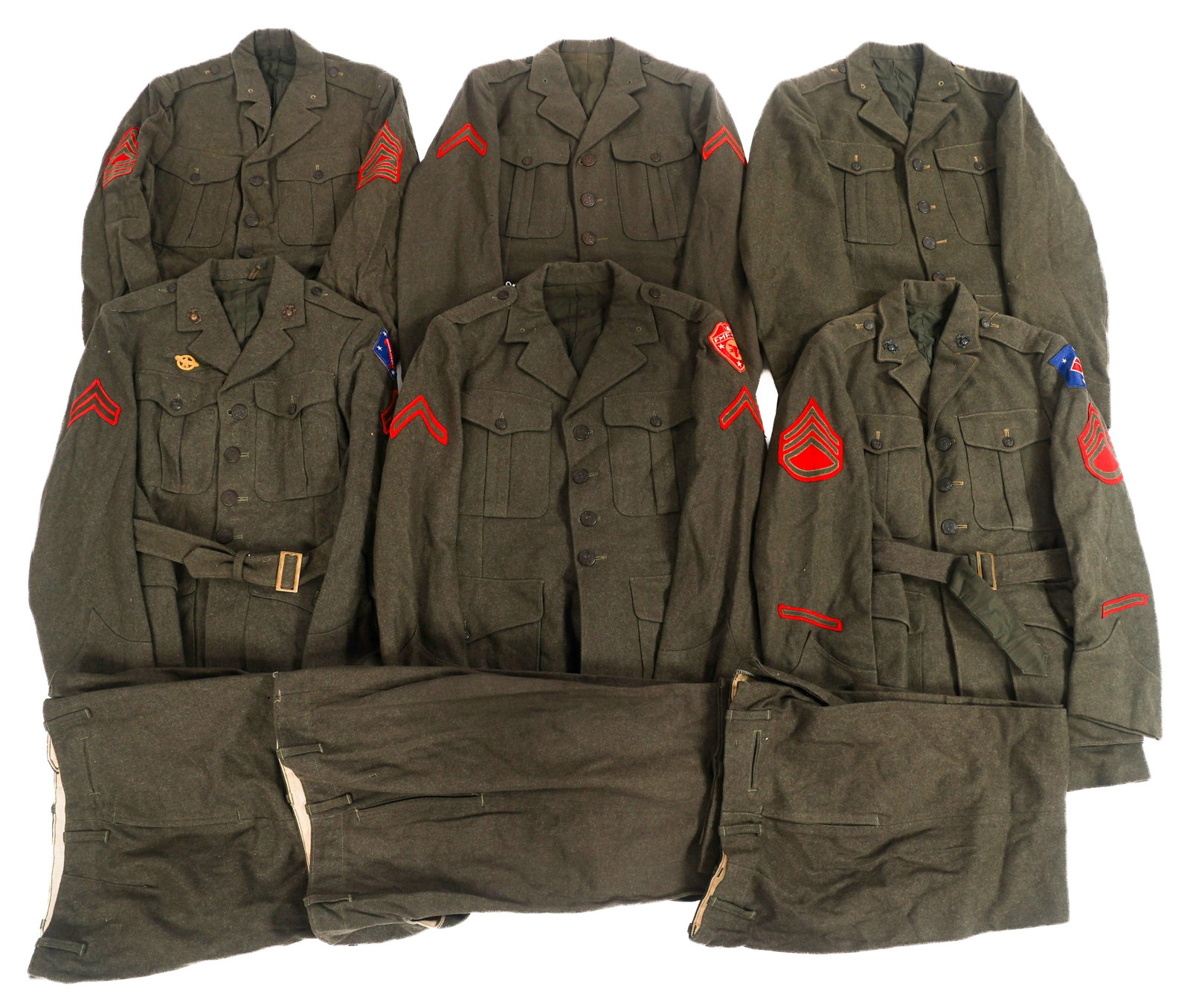 WWII USMC SERVICE ALPHA DRESS UNIFORMS: WWII USMC SERVICE ALPHA DRESS UNIFORMS WWII USMC Service Alpha Dress Uniforms. Forest green wool dress tunics, Vandegrift jackets, and trousers. Various shoulder unit patches and rank insignia. Size: 