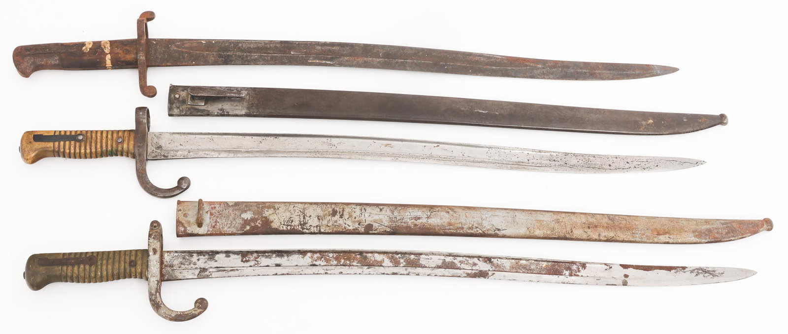 FRENCH M1866 & BRITISH P1856 YATAGHAN BAYONETS: FRENCH M1866 & BRITISH P1856 YATAGHAN BAYONETS French M1886 and British Pattern 1856 Yataghan Bayonets. (1) French M1866 Chassepot Bayonet. Single edged, bright, yataghan blade with fuller. Marked P