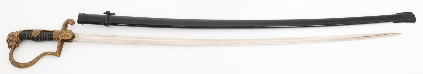 WWII GERMAN HEER LIONHEAD DRESS SWORD by EICKHORN: WWII GERMAN HEER LIONHEAD DRESS SWORD by EICKHORN WWII German Heer Officer Lionhead Dress Sword. Single edged, bright, curved blade with fuller. Maker marked by Eickhorn on the ricasso. Leather buffer