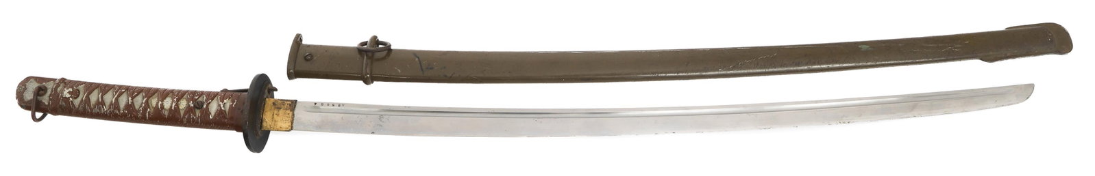 WWII IMPERIAL JAPANESE TYPE 95 NCO SHIN GUNTO: WWII IMPERIAL JAPANESE TYPE 95 NCO SHIN GUNTO WWII Imperial Japanese Type 95 NCO Shin Gunto Sword. Single edged, slightly curved blade with fuller. Serial numbered on the spine. Maker marked by Tokyo 