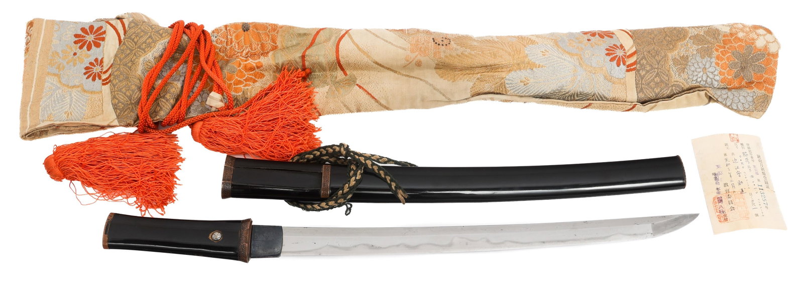 17th C. JAPANESE WAKIZASHI - TSUDA OMI NO KAMI: 17th C. JAPANESE WAKIZASHI - TSUDA OMI NO KAMI Late 17th Century Edo Period Japanese Wakizashi. Single edged, bright blade with Notare style Hamon. Blackened brass Habaki. Textured brass Fuchi. Lacque