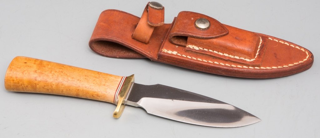 RANDALL SKINNING KNIFE: RANDALL SKINNING KNIFE 5 inch blade, 9.5 inches overall. 8.5 inch 11 5 leather sheath. Maple burl handle. Extremely good condition with minimal sheath marks. Est. 300 - 500