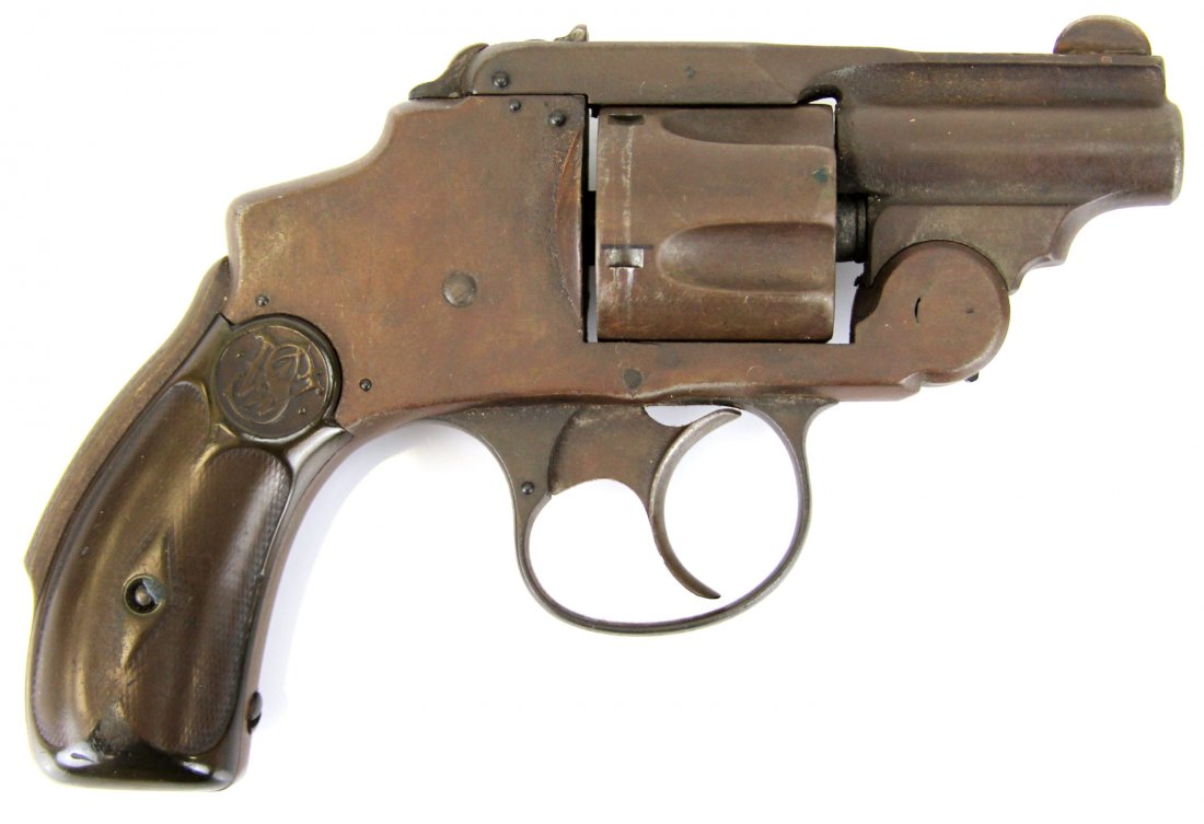 SMITH & WESSON SAFETY HAMMERLESS .38 REVOLVER: SMITH & WESSON SAFETY HAMMERLESS .38 REVOLVER Smith & Wesson Safety Hammerless top break revolver. 1 3/4 inch barrel with top rib, and 5 shot fluted cylinder. Type: Revolver . Manufacturer: Smith & We