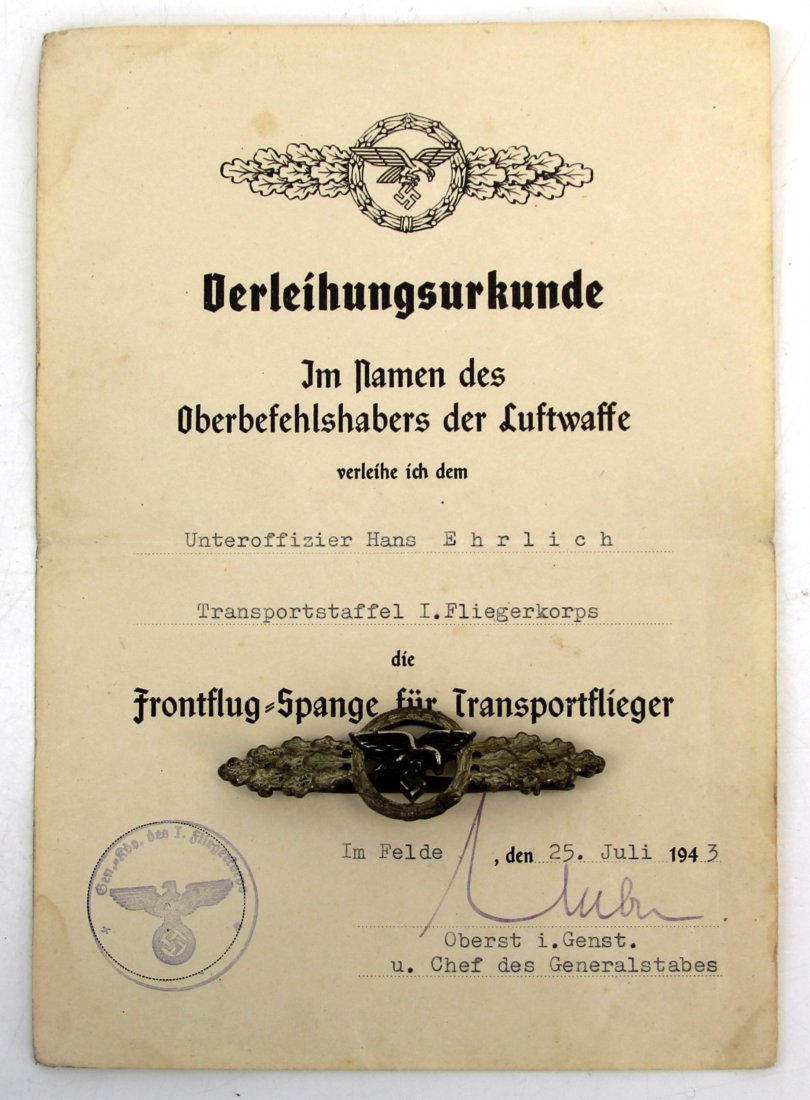 WWII GERMAN TRANSPORT/GLIDER CLASP WITH DOCUMENT: WWII GERMAN TRANSPORT/GLIDER CLASP WITH DOCUMENT WWII German Transport/Glider clasp in silver. Measures 3 inches, by one inch in middle. Coke bottle pin on back, and no makers markings. Accompanied by