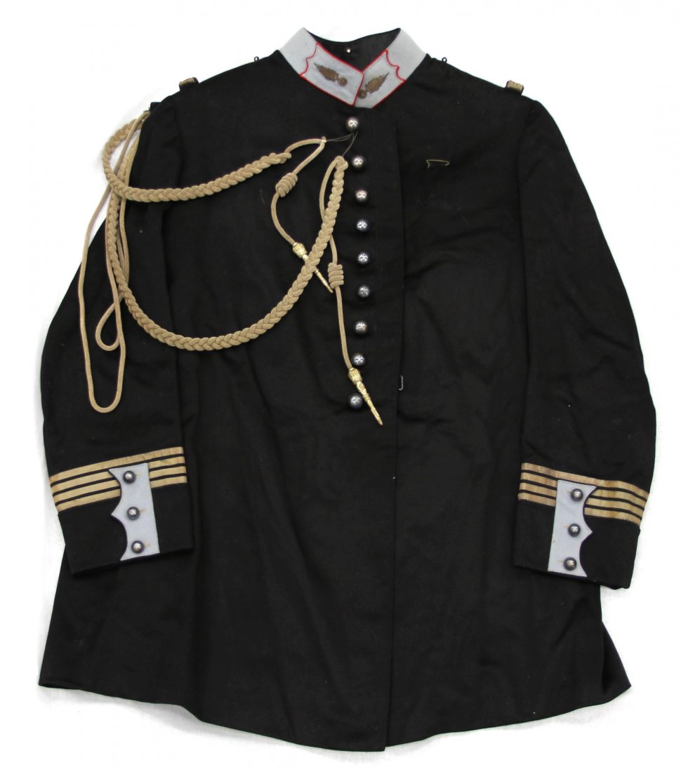 FRENCH ARTILLERY OFFICER'S JACKET RAUCH & CIE: FRENCH ARTILLERY OFFICER'S JACKET RAUCH & CIE 34" from tail to collar and 18" at the shoulders. Country: France