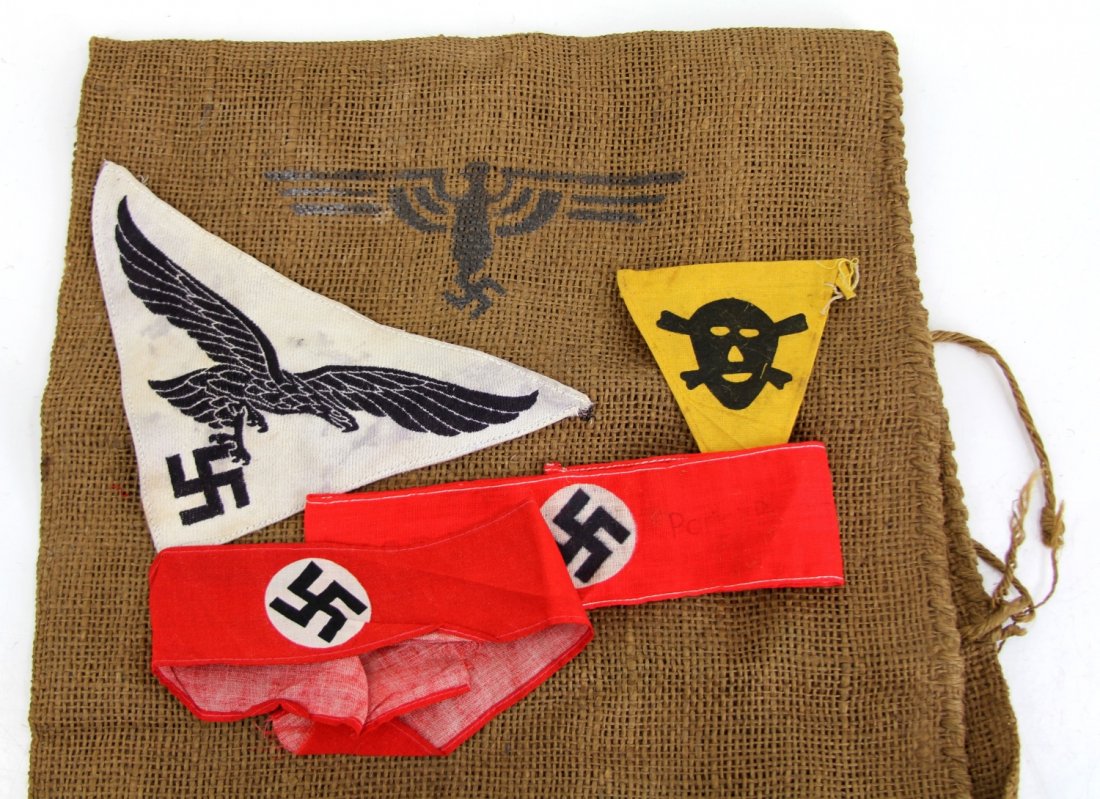 WWII GERMAN CLOTH ITEMS LOT: WWII GERMAN CLOTH ITEMS LOT Burlap sack, armbands, mine flag, and Luftwaffe patch. Country: Germany