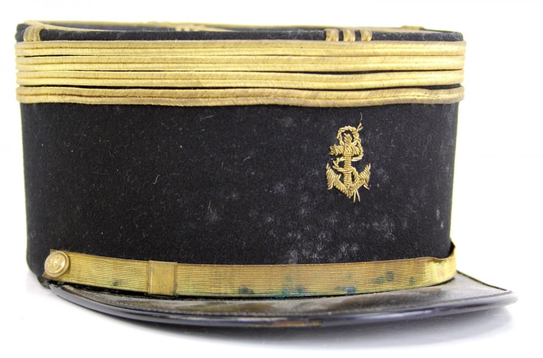 FRENCH TROUPE COLONIALE MARINE KEPI: FRENCH TROUPE COLONIALE MARINE KEPI French Troupe Colonial Marine felt coffee can style kepi. Four gold bands at top, with naval fouled anchor insignia in gold bullion on front. Country: France