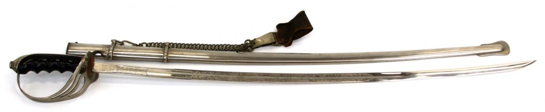 ETCHED M1902 US OFFICER SWORD WITH CHAIN HANGER: ETCHED M1902 US OFFICER SWORD WITH CHAIN HANGER By N.S. Meyer. Type: Sword Country: US Blade Length: 30" Overall Length: 35"