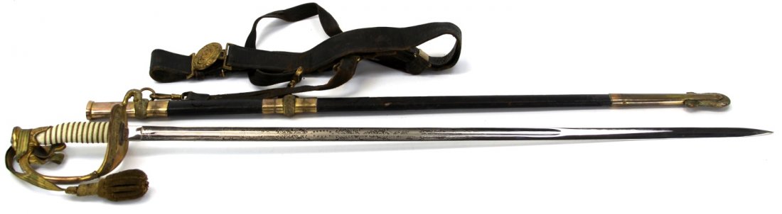 20TH CENTURY US MODEL 1852 NAVAL DRESS SWORD: 20TH CENTURY US MODEL 1852 NAVAL DRESS SWORD US Model 1852 Navy Officer's dress sword, with scabbard and belt. Marked "MADE USA" on ricasso and etched in naval motif. Faux shagreen grip with gilt bras