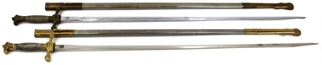 TWO MILITARY ACADEMY CADET SWORDS SAUNTON & OTHER: TWO MILITARY ACADEMY CADET SWORDS SAUNTON & OTHER A.) Saunton Military Academy cadet sword, trademarked Spartan on ricasso, and retailer marked NS Meyer, New York on obverse, made in Germany. B.) Unma